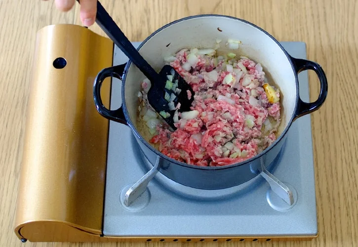 炒める